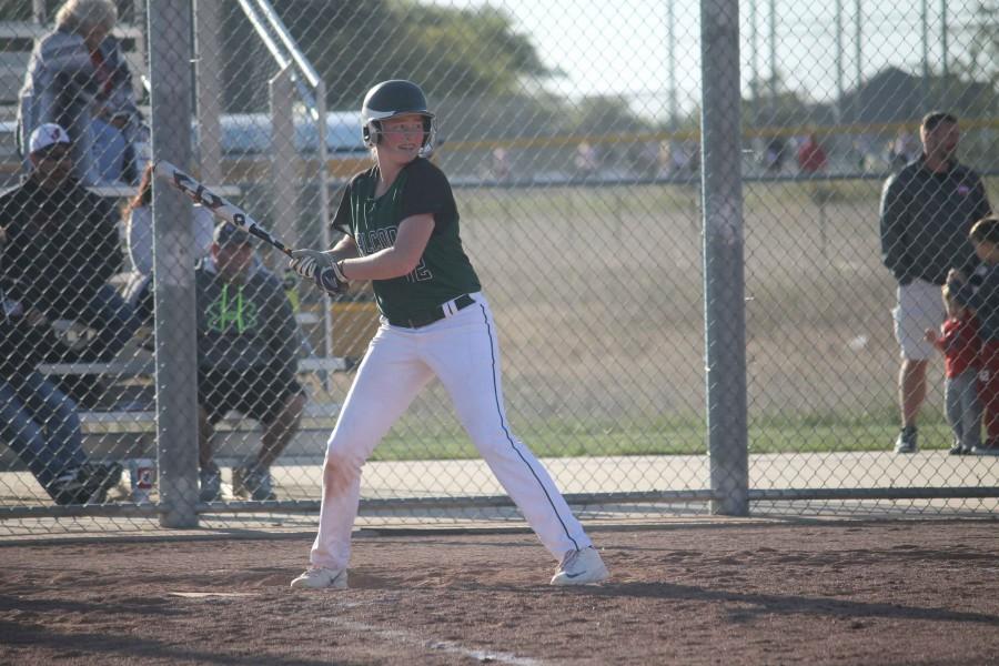 Freshman Alana Vawter plays in the game against Fort Osage High School on Oct. 1. Vawter has been playing softball since she was 7. “Softball is fun because not only are the people great, but everyone loves to win. So whenever we win it just makes it all more fun,” Vawter said. 
