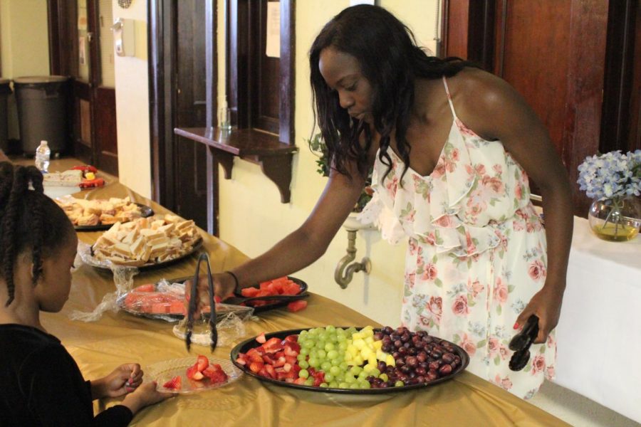 At the Hope Center’s awards ceremony on May 22, sophomore Nia Daniels helps serve food for the kids. The ceremony was to honor and recognize the different program’s accomplishments and service. “Everyone was celebrated and people had a great time,” said Daniels.