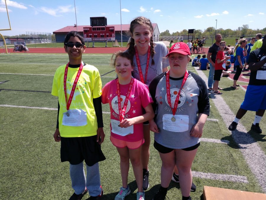 At this year’s Regionals, sophomore Nasi Wright, freshman Casey Dodge, Staley alumni Emily Taylor and Staley Unified Partner Addy Bahn smile with their medals for the Unified 4x1 Relay Raceon Apr. 27 at Lees Summit Highschool. Dodge competed in softball, track and bowling this year. When asked what she felt to win the medal, “Happy.” said Dodge.