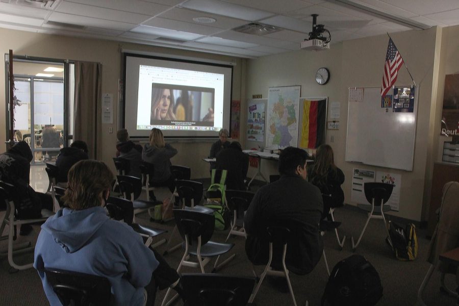 While watching German music videos in class on March 10, senior Tomas Reyes Jr. listens to the music. The class was learning the difference in sound of German music compared to the English version. Honestly I think its a crying shame, Reyes said. More people should learn more dramatic languages. 