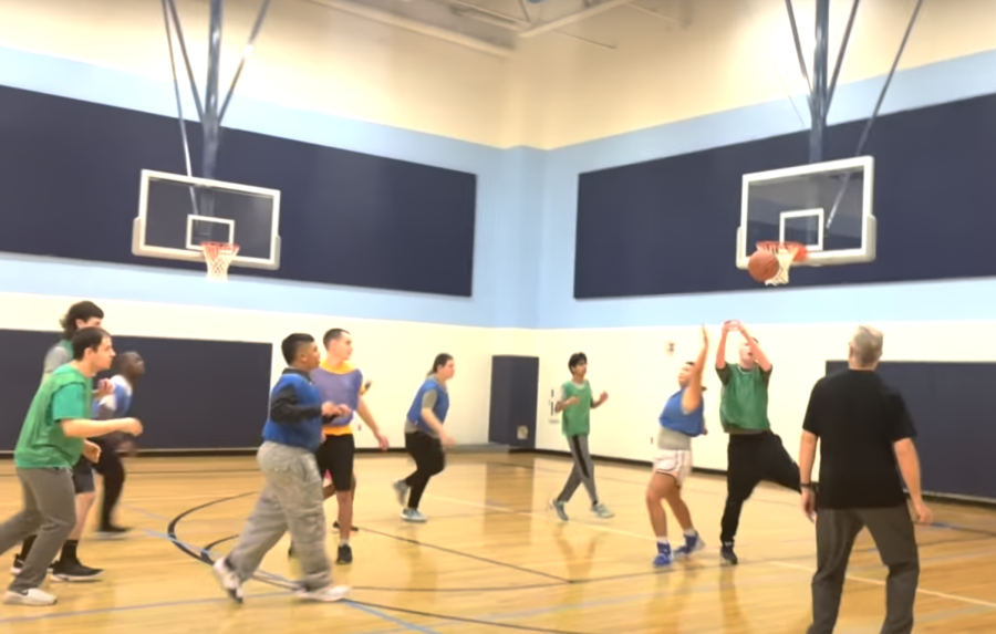 Special Olympics Hoopers, Partners Have Fun