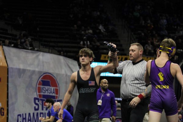 Boys state wrestling day 1, Feb. 23; Junior Zayne Reynolds