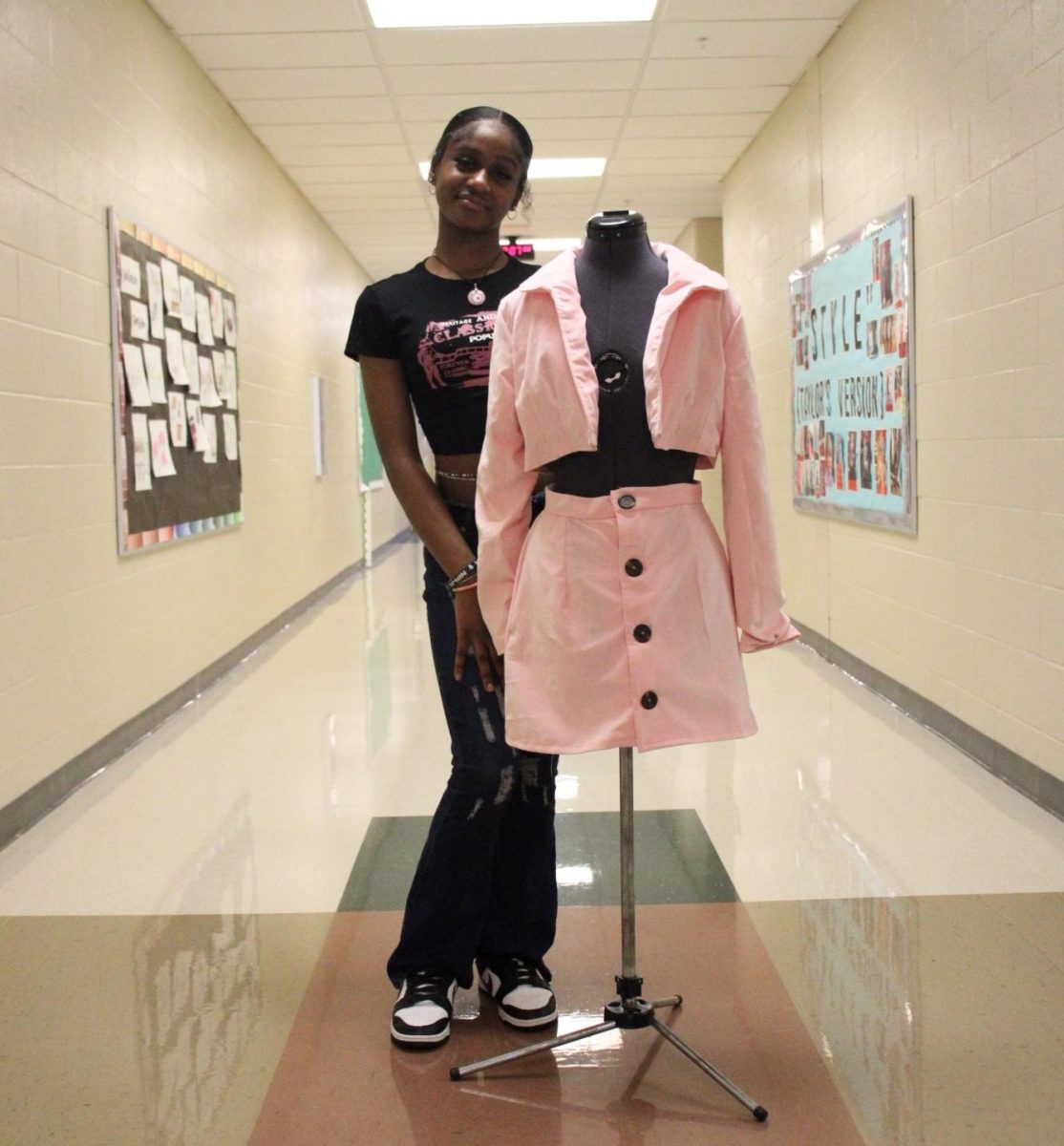 Advanced Fashion Product Development student sophomore Michala Rose and one of the garments she created for class.