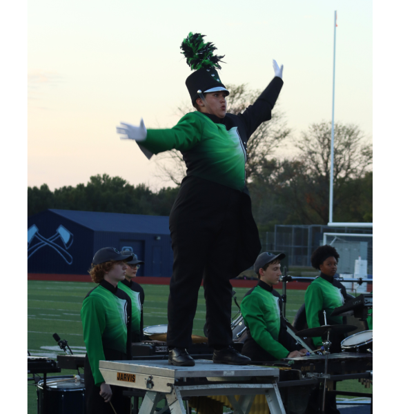 The Falcon Brigade and Diamonds color guard perform at Oak Park High School Sept. 18 in an exhibition where all four high schools showcase their halftime and competition shows. 