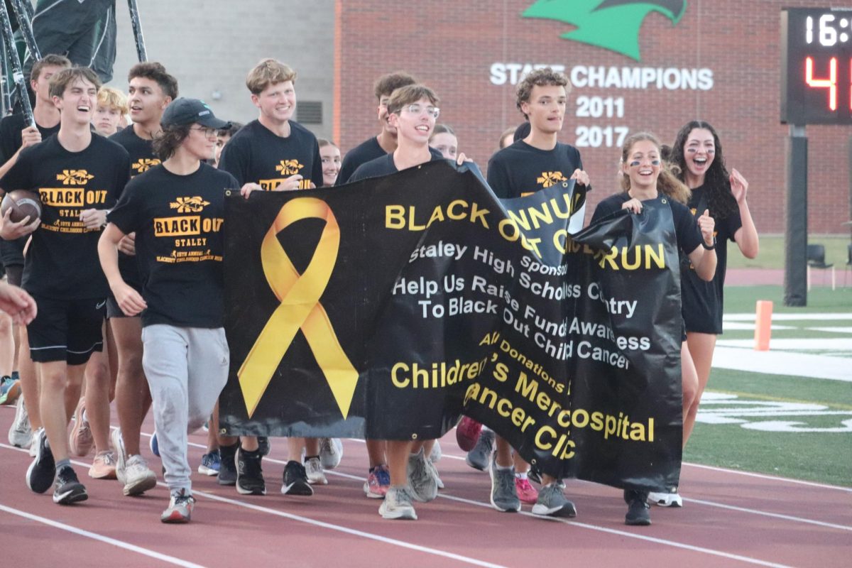 Cross Country team hosts Blackout Run to fight Childhood Cancer Oct. 4