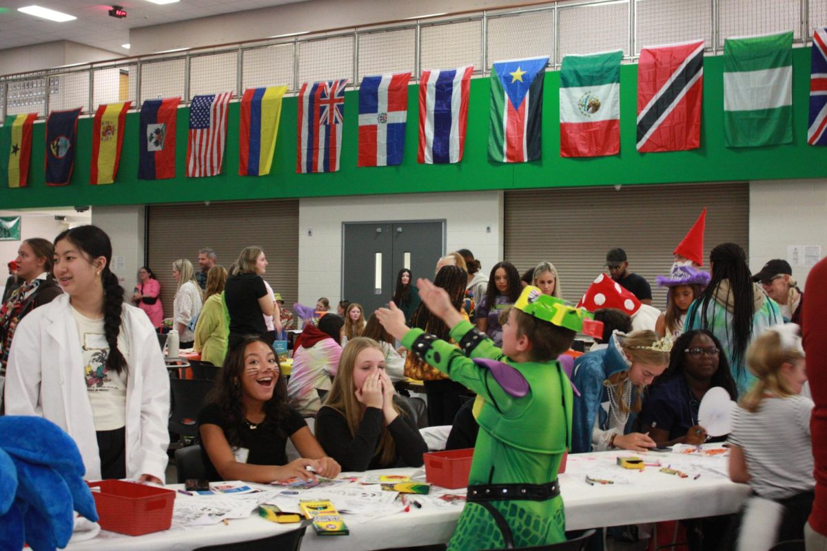 Interact club hosts Halloween Hallways for the feeder schools Oct. 30. Clubs and activities hosted booths with activities and candy.