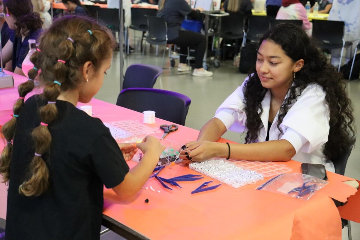 Interact club hosts Halloween Hallways for the feeder schools Oct. 30. Clubs and activities hosted booths with activities and candy.