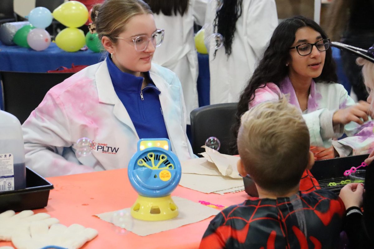 Interact club hosts Halloween Hallways for the feeder schools Oct. 30. Clubs and activities hosted booths with activities and candy.