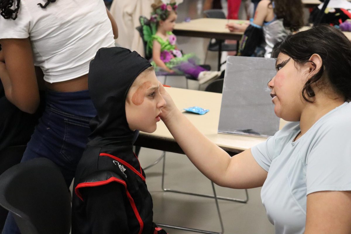 Interact club hosts Halloween Hallways for the feeder schools Oct. 30. Clubs and activities hosted booths with activities and candy.