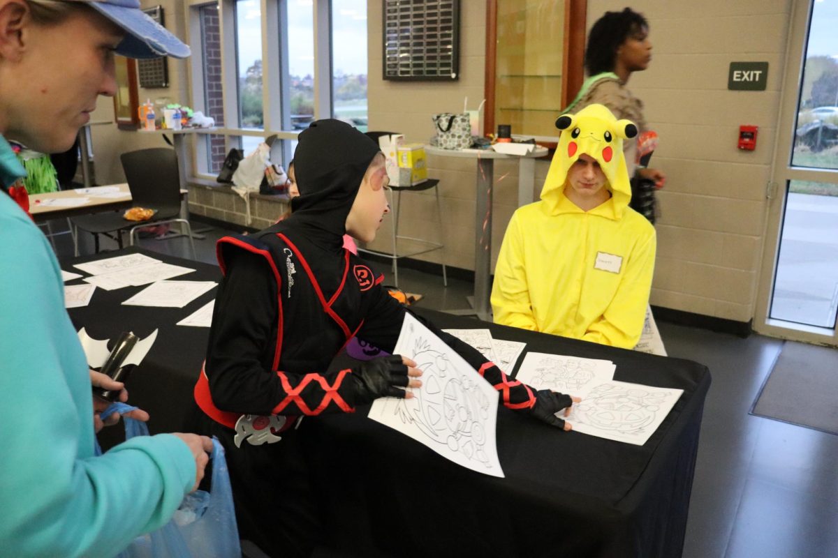 Interact club hosts Halloween Hallways for the feeder schools Oct. 30. Clubs and activities hosted booths with activities and candy.