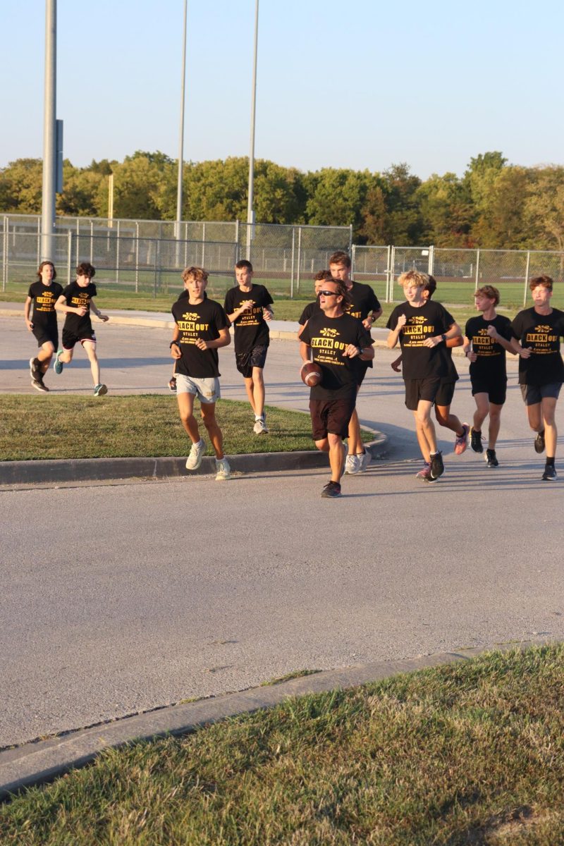 Cross Country team hosts Blackout Run to fight Childhood Cancer Oct. 4