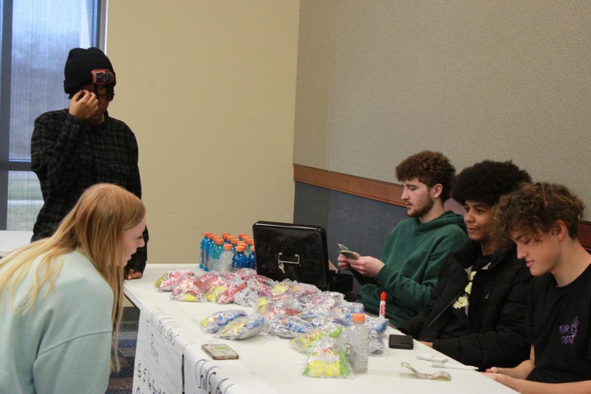 Entrepreneurship students work at the Falcon Fair Dec. 12.