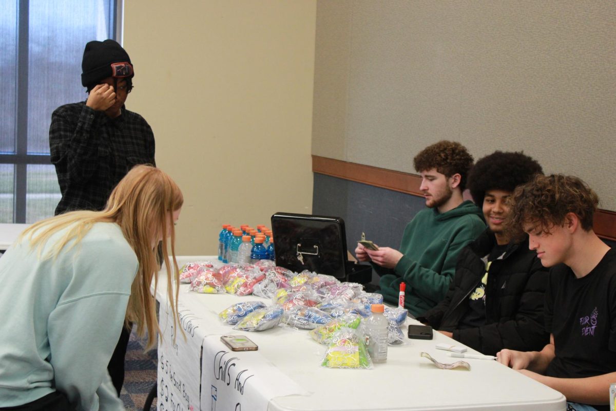 Entrepreneurship students work at the Falcon Fair Dec. 12.