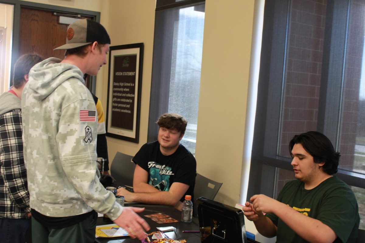 Entrepreneurship students work at the Falcon Fair Dec. 12.