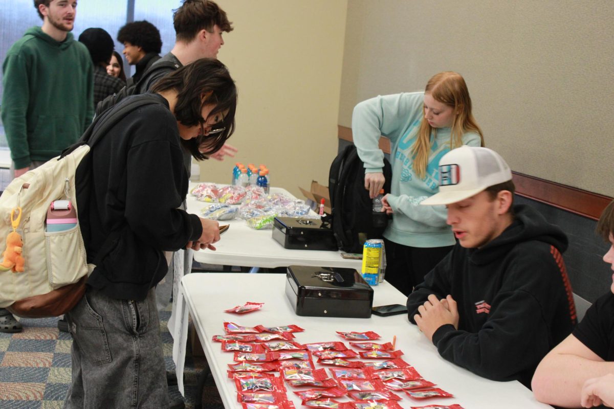 Entrepreneurship students work at the Falcon Fair Dec. 12.