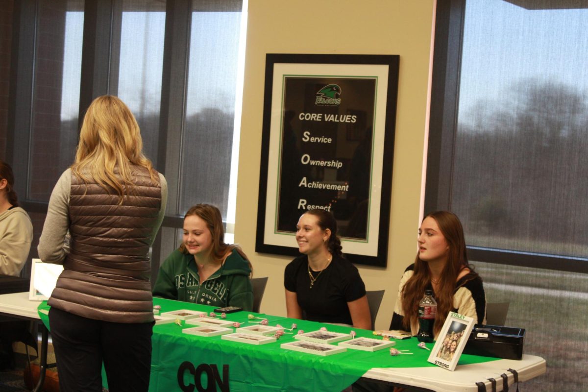 Entrepreneurship students work at the Falcon Fair Dec. 12.