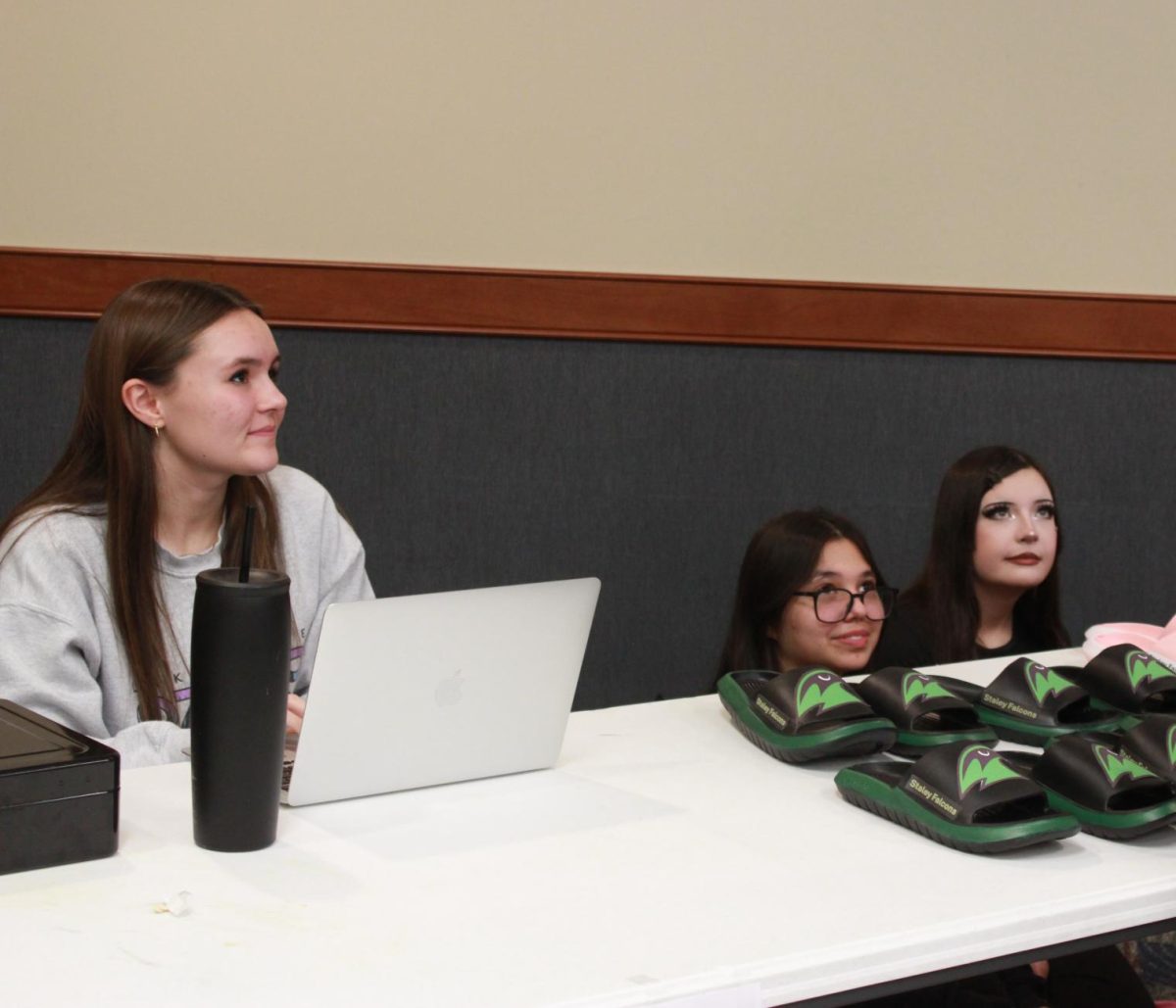 Entrepreneurship students work at the Falcon Fair Dec. 12.