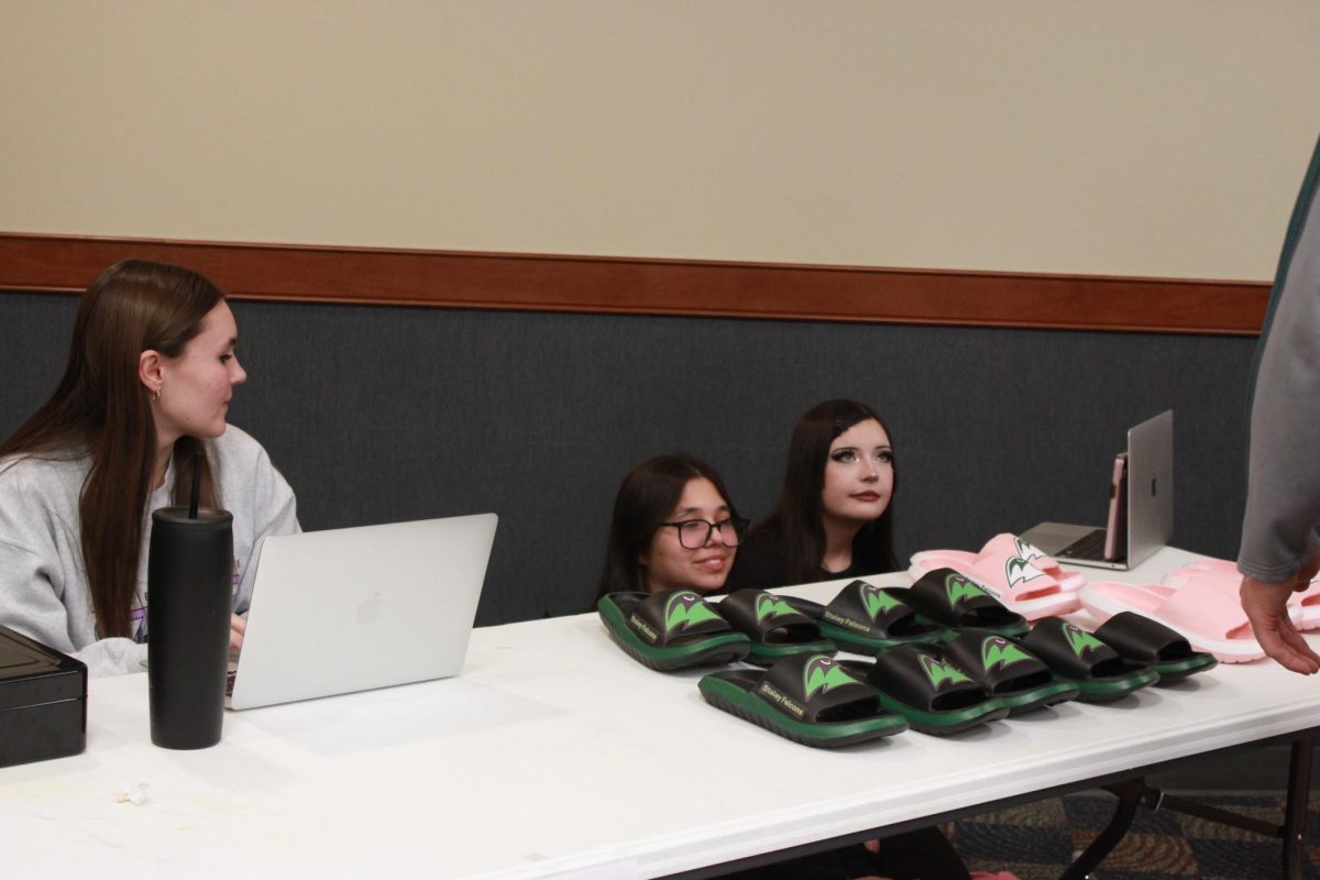 Entrepreneurship students work at the Falcon Fair Dec. 12.