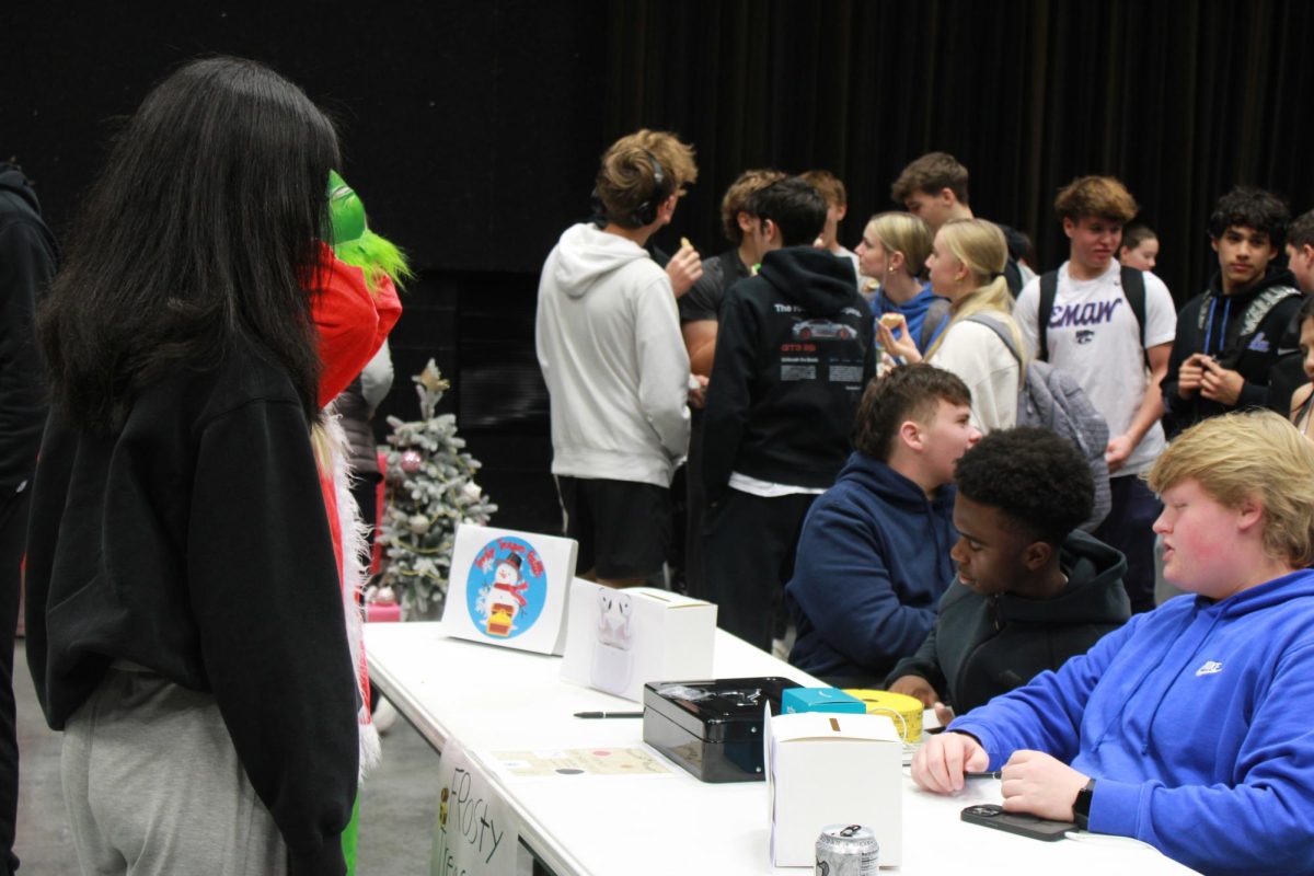 Entrepreneurship students work at the Falcon Fair Dec. 12.