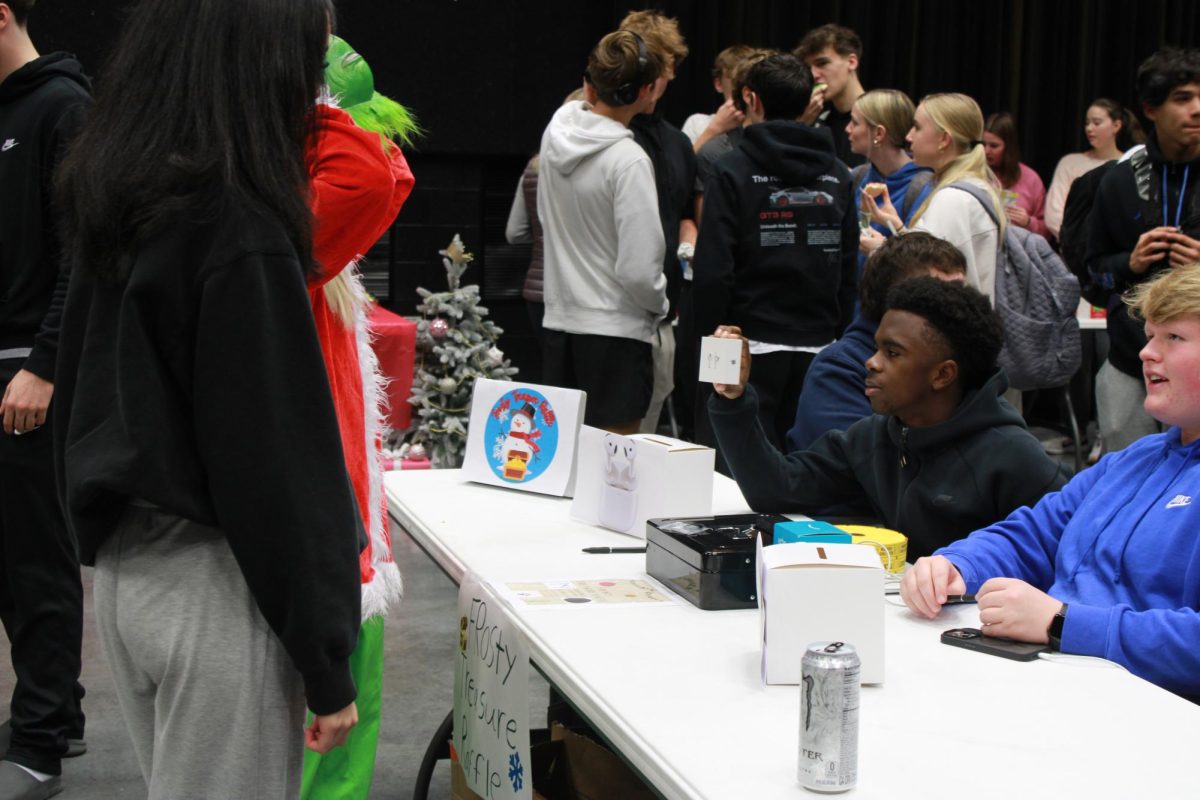 Entrepreneurship students work at the Falcon Fair Dec. 12.