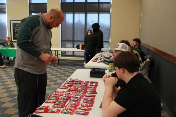 Entrepreneurship students work at the Falcon Fair Dec. 12.