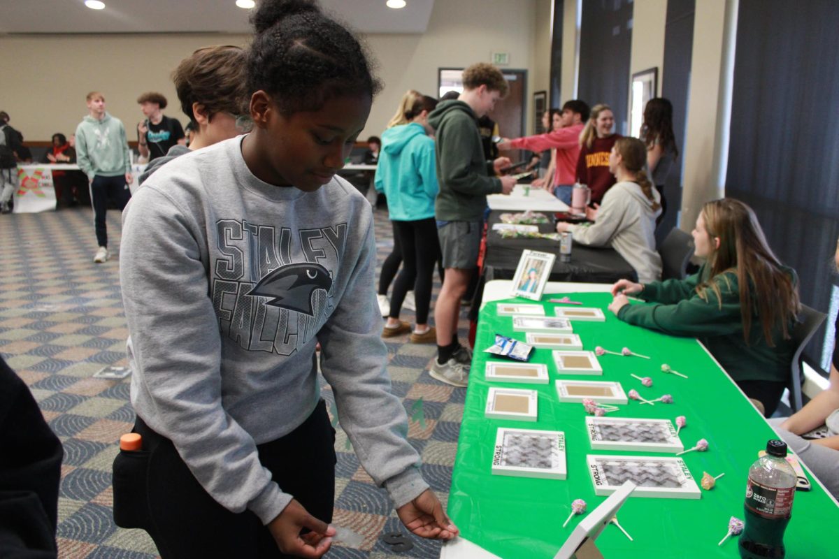 Entrepreneurship students work at the Falcon Fair Dec. 12.