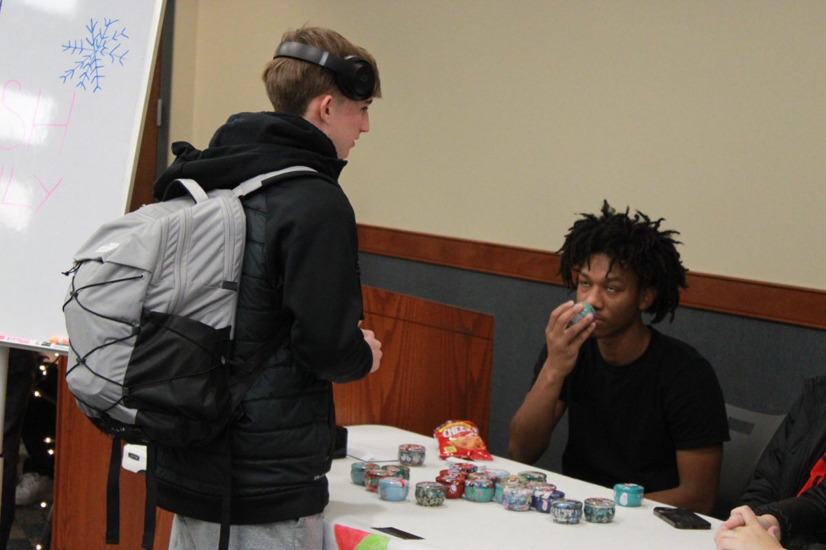 Entrepreneurship students work at the Falcon Fair Dec. 12.