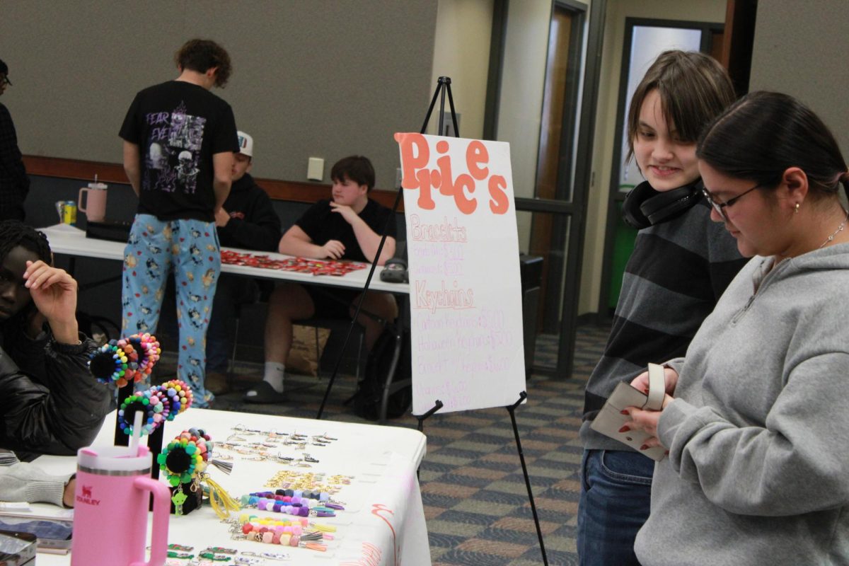 Entrepreneurship students work at the Falcon Fair Dec. 12.