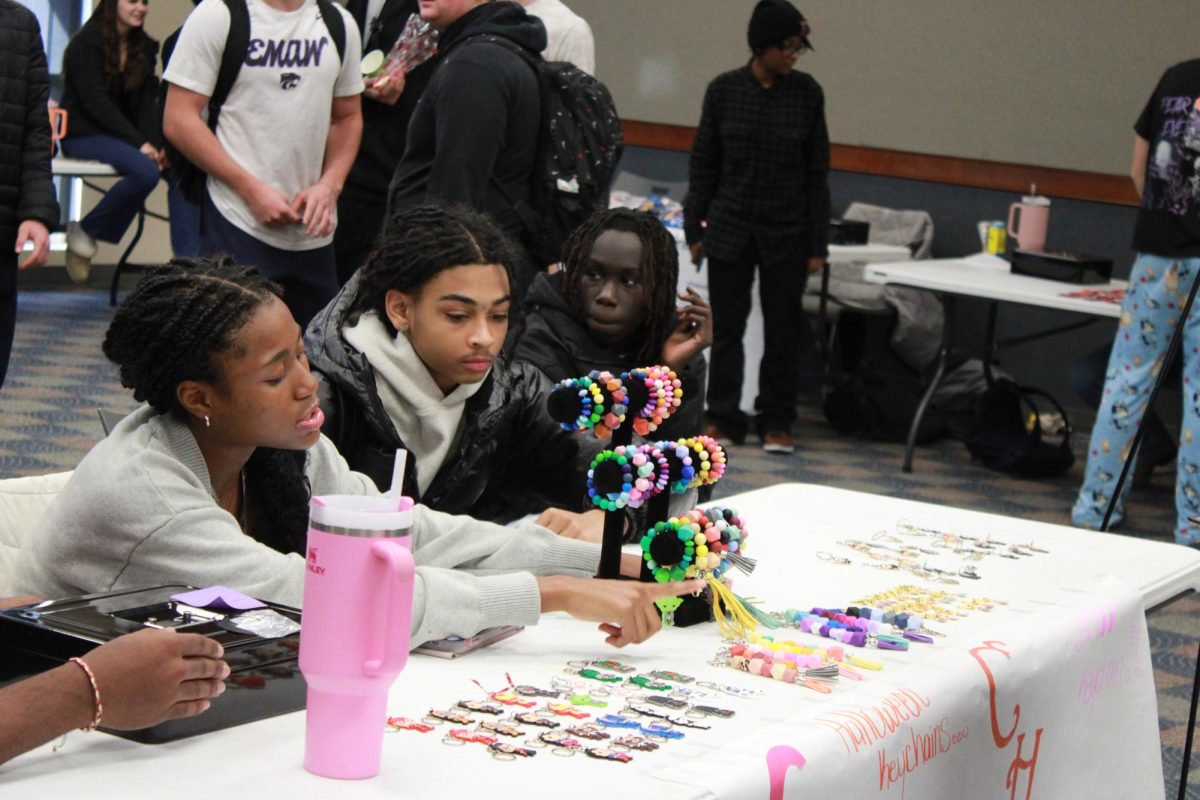 Entrepreneurship students work at the Falcon Fair Dec. 12.