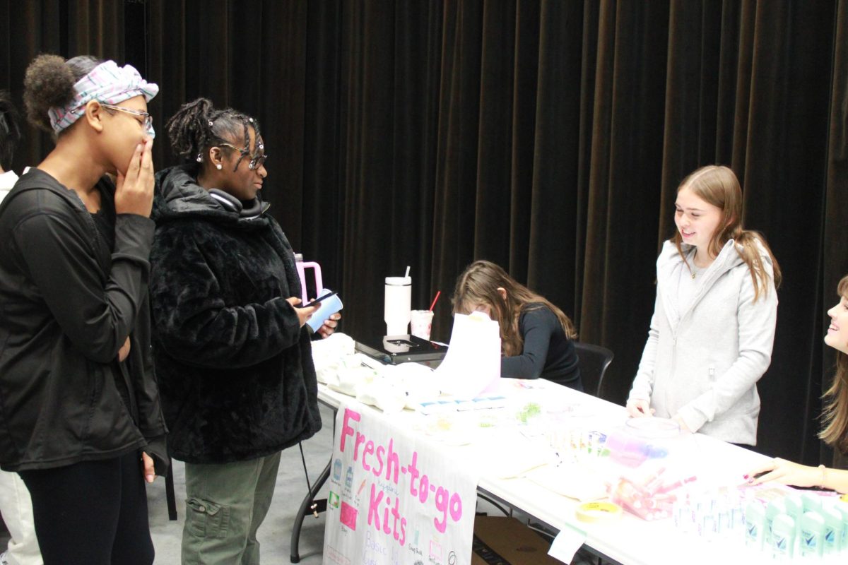 Entrepreneurship students work at the Falcon Fair Dec. 12.