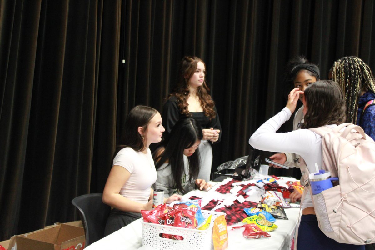 Entrepreneurship students work at the Falcon Fair Dec. 12.