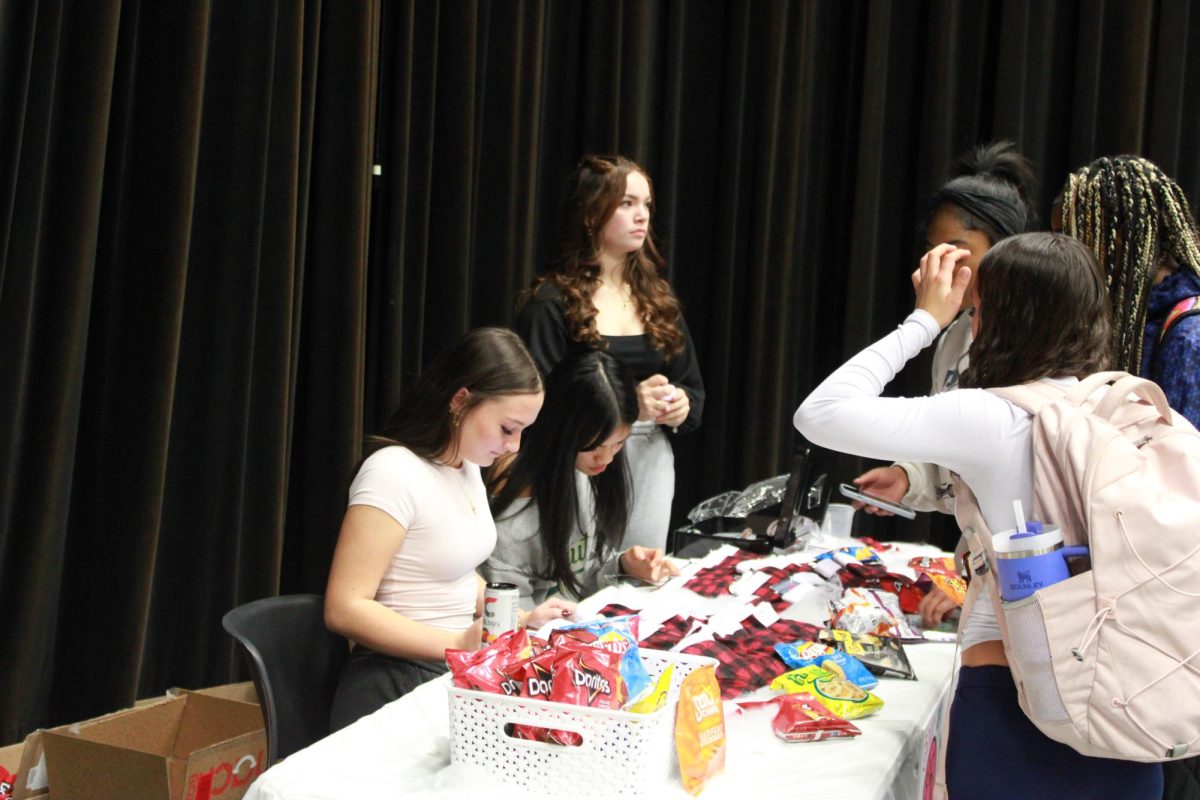 Entrepreneurship students work at the Falcon Fair Dec. 12.