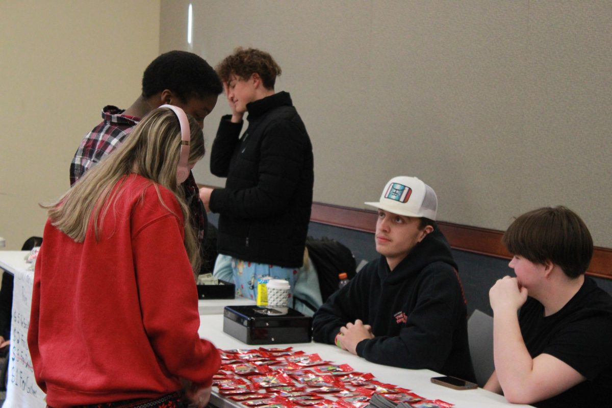 Entrepreneurship students work at the Falcon Fair Dec. 12.