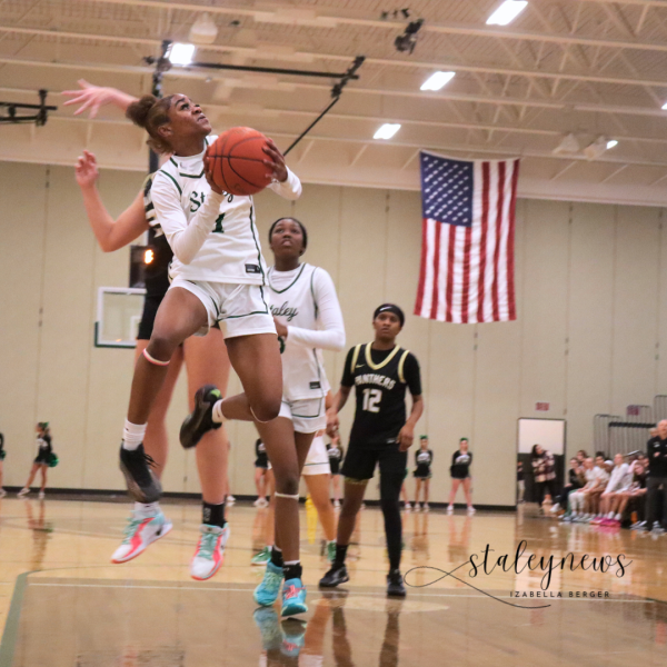 The girls basketball team beats Raymore Peculiar High School 64-36 Feb. 6.