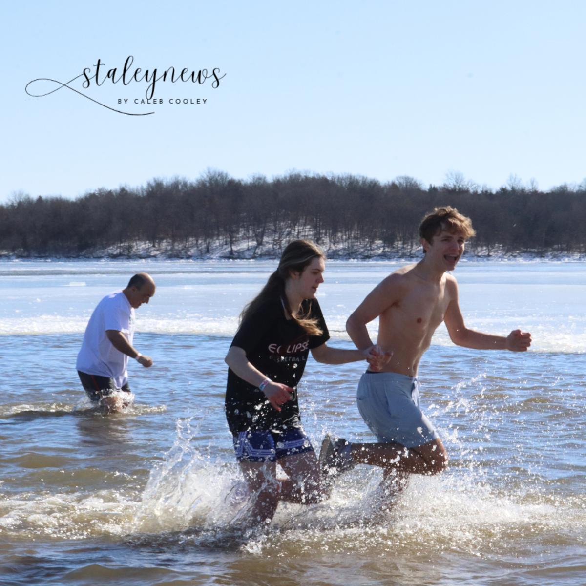 Polar Plungers Run Into Lake For Special Olympics