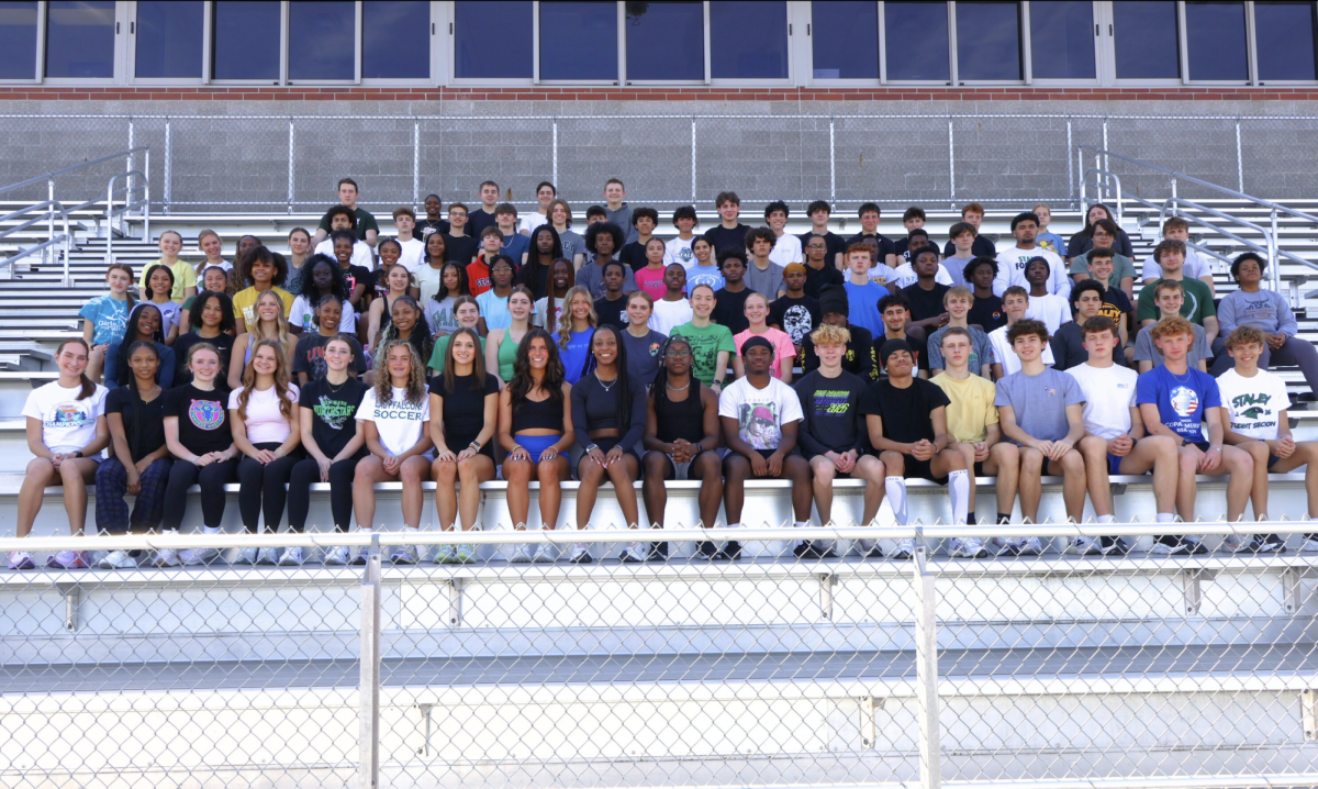 Track & Field 2026: Row 1: Audrey Richter, Nadirah Pryor, Sophie Zaruba, Katelyn Anderson, Demi Bologna, Claire Smith, Jillian Burks, Chloe Van Meter, Orryn Wright, Brian McCall, Robert Mills IV, Cameron Meyer, Tamahn Wells, Embry Wazac, Beckett Dold, Drake Crockett, Chase Bennett, Oliver McKenna Row 2: Gabrielle Perkins, Kaitlyn Wansley, Reese Reno, Nyeira Bayan, Ja'Sonni Marchbanks, Brooke Sammons-Riley, Kendall Bruner, Noelle Boekhout, Chloe Johnson, Lauren Stoflet, Zaylee Berger, Amhir Deslices, Jafer Jasim, Caleb Nye, Harlen Musick, Da’vion Lewis, Tyler Carrington Row 3: Jaylyn Price, Makayla Andrews, Ella Johnson, Annabelle Owens, Grace Muktar, McKenzie Cadue, Aubree Vickers, Shia Anthony, Malia Kone, Feneal Kromah, Jaden Randle, Aaron Winters III, Jeremy Wright Jr., Braden Kurbin, Jeremy Benye, Isaiah Terry, James Kromah, Harlan Barbour, Pierce Strauch, Triston Gantt Row 4: Henli Albers, Kinley Graybill, Morgan Robins, Adalyn Holmes, Mia Johnson, Olivia Robinson-Harton, Saraya Gant, Isaac Holm, Achilles Woodard, Evan C. Johnson, Ella Johnson, Marisa Prado, Liam Garrett, Aleckye Myers, Vienney Nakaabale, Emojeme Ogolor, Elias Baker, Halatoa Ofahulu, Seeley Sousley, Cooper Unruh Row 5: Keegan Wink, Cole McCart, Nicholas Windholz, Aidan Priest, Garrett Cullen, Keaton Adams, Zavier Moore, Dominic Estrada, Kai Fillingham, Kody Secaida, Roland Shafer, Micah Hibbard, Dominick Hibbard, Brent Howe, Molly Yaple, Reese Hubbell Row 6: William Dean, Londyn Dantzler, Elijah Punzo, Trey Wilson, Joseph Svoboda 